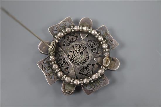 An early 20th century Arts & Crafts white metal and cabochon stone set brooch, in the manner of Sibyl Dunlop, 5cm, gross 24 grams.